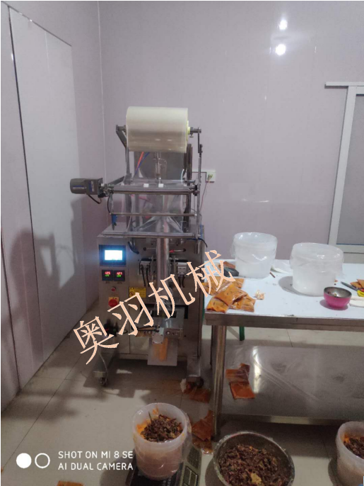 安徽板面底料包裝機  辣椒+牛油固定比例自動包裝_http://m.financialpredictions.com_立式包裝機系列_第1張